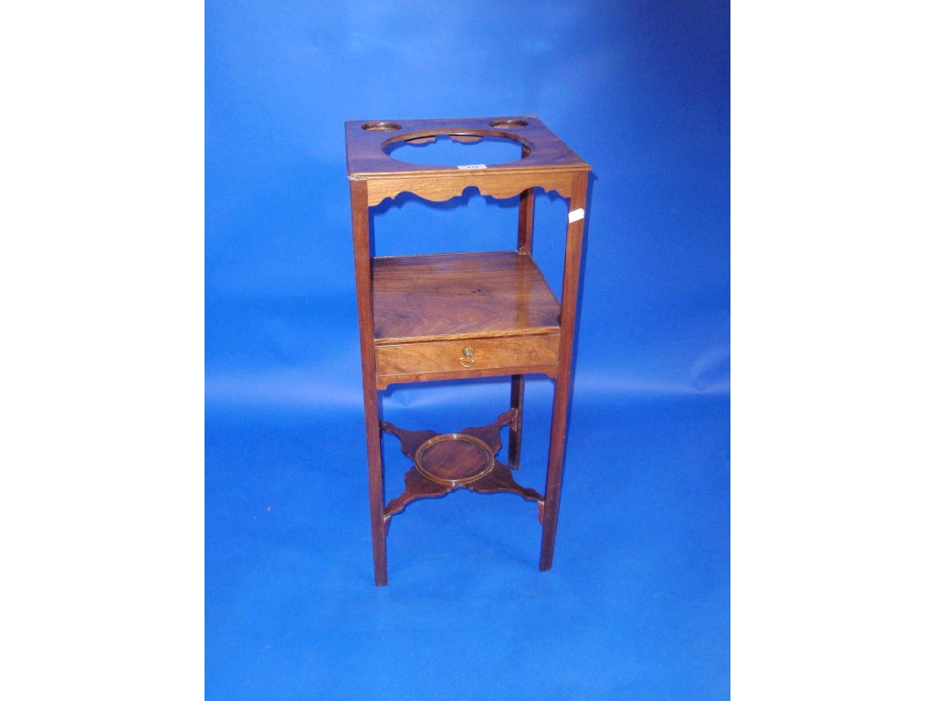 Appraisal: A Georgian flamed mahogany washstand with triple recess top drawer