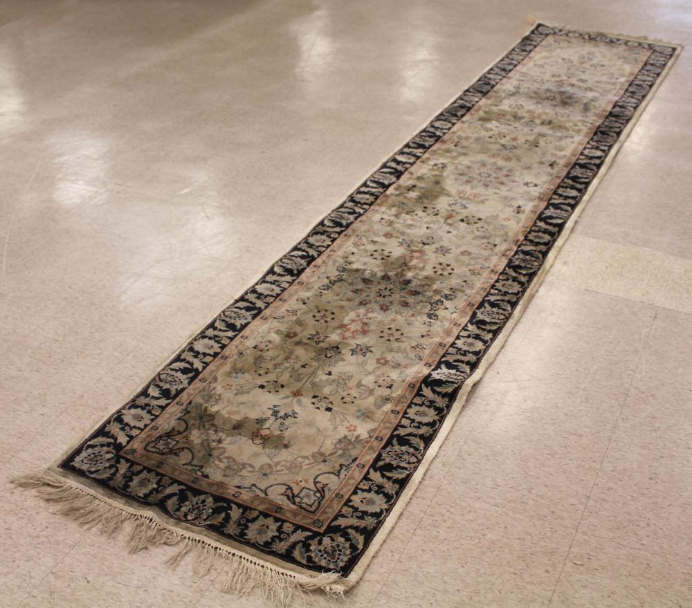 Appraisal: HAND KNOTTED ORIENTAL SILK-LIKE RUNNER Sino-Persian overall floral design on