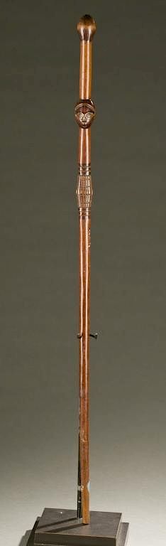 Appraisal: Chokwe complex wooden staff th c A wooden staff with