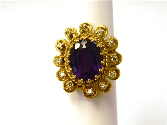 Appraisal: JEWLERY Amethyst and Diamond Ring K yellow gold oval medium