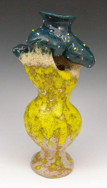 Appraisal: KATHY BUTTERLY SIGNED POTTERY FIGURE ''Making Light of the Ache''