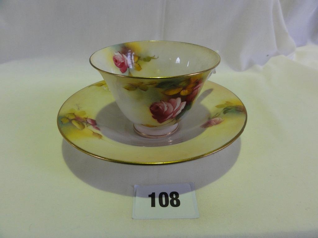 Appraisal: A Royal Worcester cup and saucer with painted pink rose