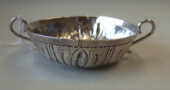 Appraisal: A silver twin handled small circular dish of shallow form