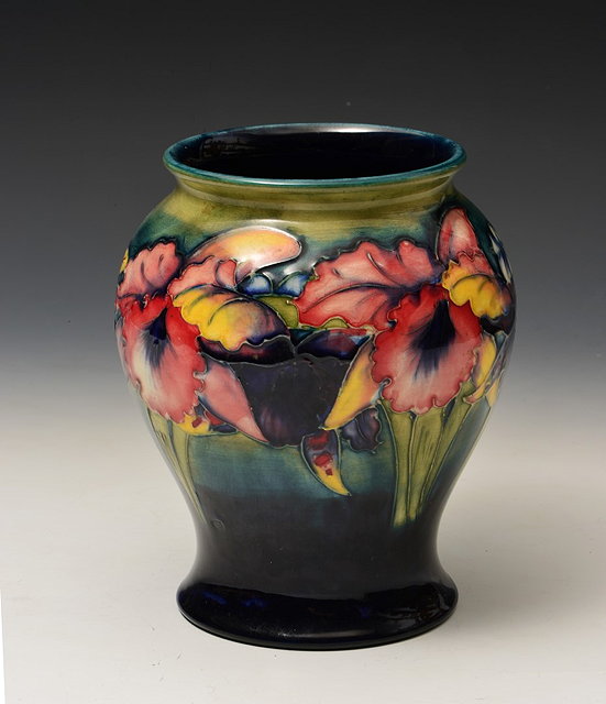 Appraisal: Moorcroft'Orchid' vase on turquoise groundunderglazed initials stamped facsimile signature and