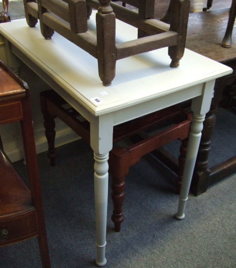 Appraisal: A grey painted rectangular table resting on tapering turned legs