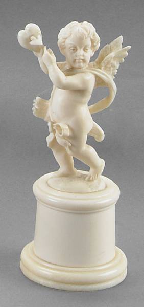 Appraisal: A Continental carved ivory figure of Cupid late th early