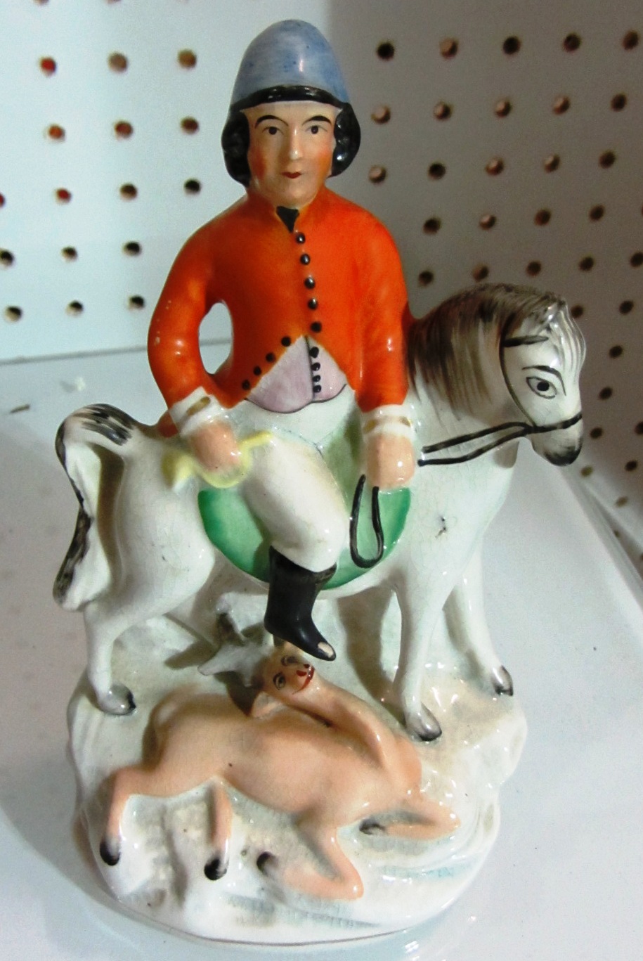 Appraisal: A Staffordshire figure of a hunstman and a Herend porcelain