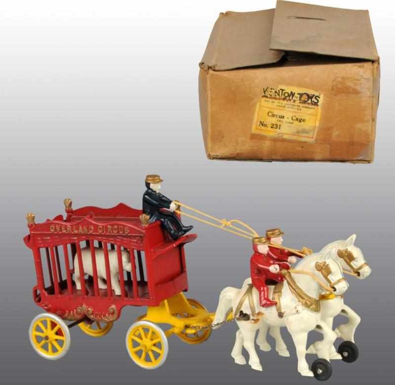 Appraisal: Cast Iron Kenton Horse-Drawn Circus Wagon Toy Description American Toy