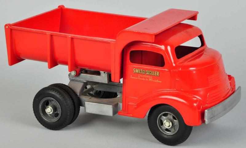 Appraisal: Pressed Steel Smith-Miller Dump Truck Toy American Ratchet gear dump