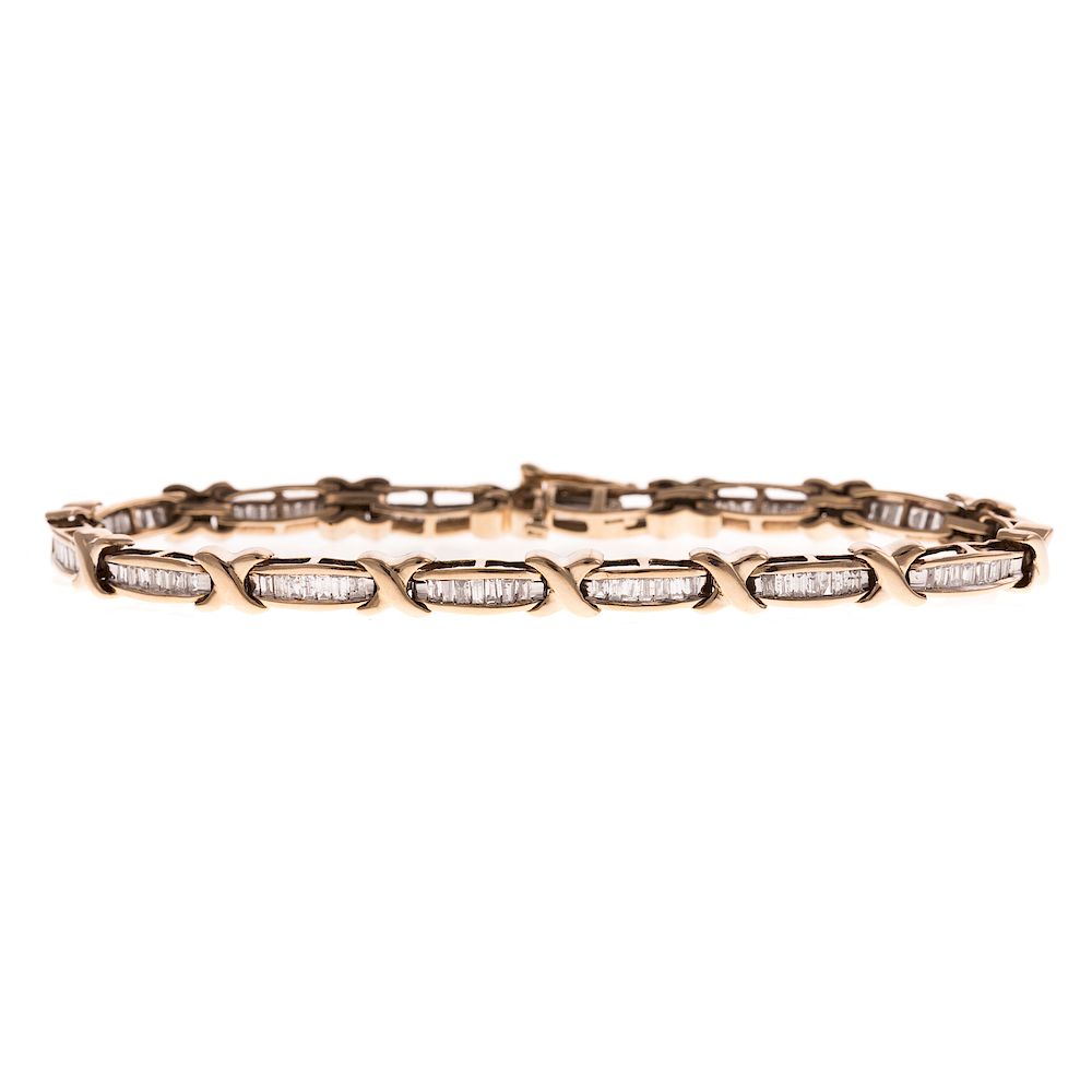 Appraisal: A Ladies Diamond X Bracelet in K K yellow gold