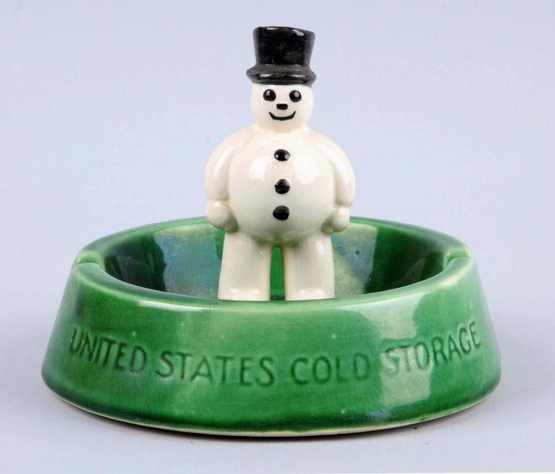 Appraisal: U S Cold Storage Snowman Ashtray This United States Cold