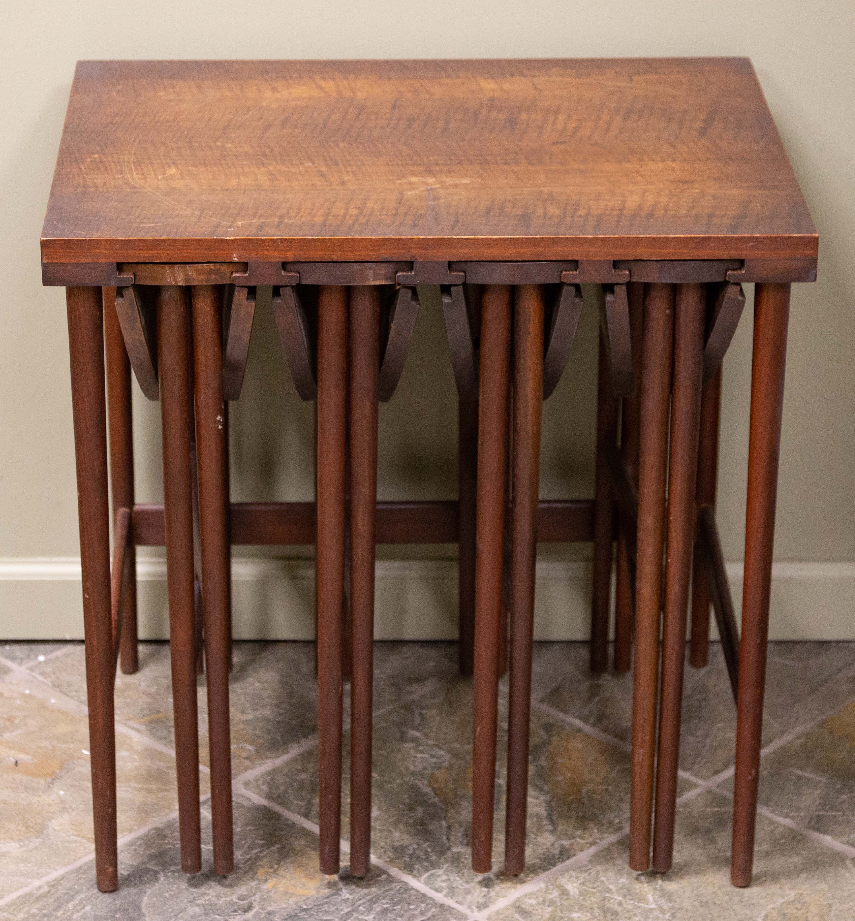 Appraisal: BERTHA SCHAEFER NESTING TABLES Figured walnut For Singer Sons circa