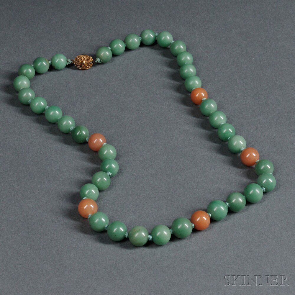 Appraisal: Beaded Necklace China composed of green and beige stones with