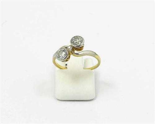 Appraisal: DIAMOND RING ca Platinum and yellow gold Decorative Crois model