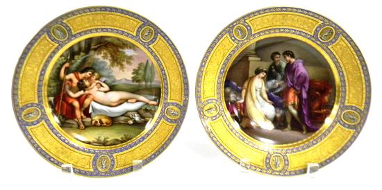 Appraisal: Pair of artist signed cabinet plates each with heavily decorated