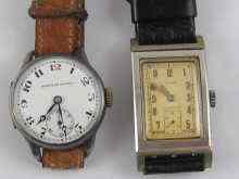 Appraisal: A round silver wrist watch with enamel dial movement by