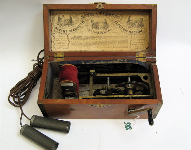 Appraisal: DAVIS AND KIDDER'S MAGNETO-ELECTRIC DIAGNOSTIC MACHINE dated The hardwood fitted