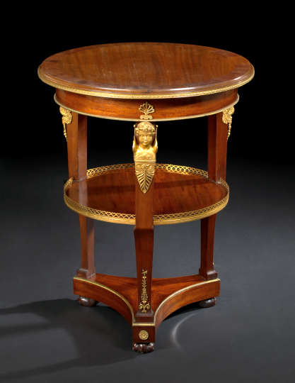 Appraisal: Empire-Style Ormolu-Mounted Mahogany Occasional Table the circular cross-banded top over