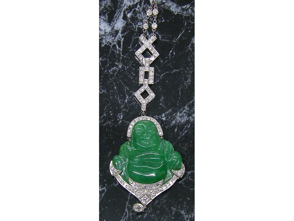 Appraisal: Unusual platinum diamond and jade pendant in the form of