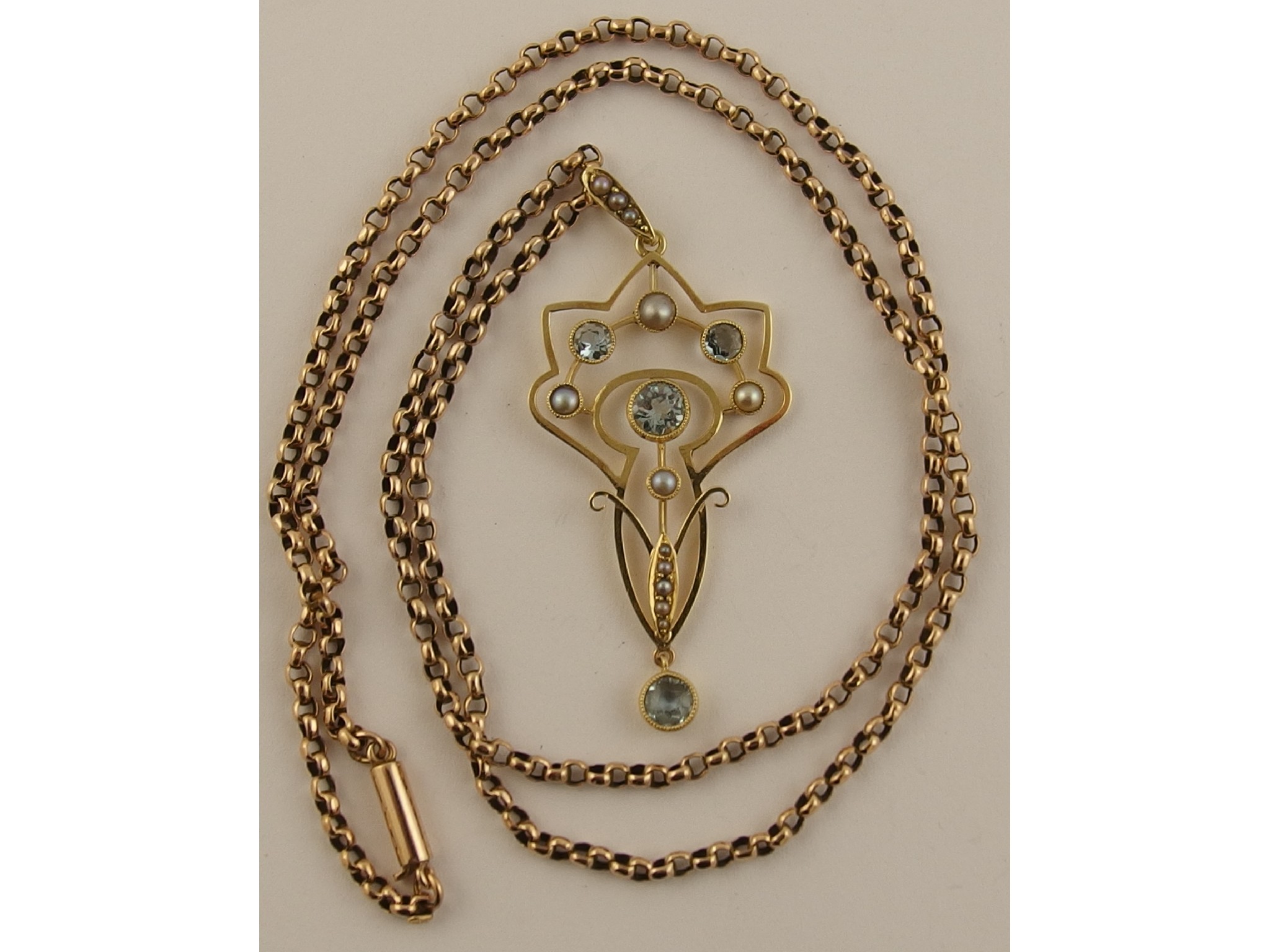 Appraisal: A ct gold Edwardian aquamarine and seed pearl pendant with