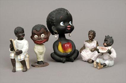 Appraisal: Five Porcelain Chalkware and Papier-M ch Bobbing-Head African-American Figures to