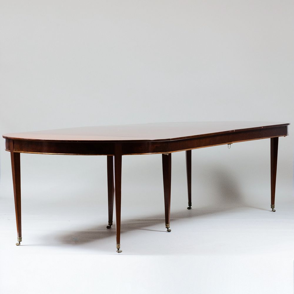 Appraisal: Directoire Gilt-Metal-Mounted Mahogany Extension Dining Table Raised on casters and