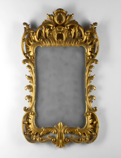 Appraisal: Italian Giltwood Looking Glass late th century the rounded rectangular