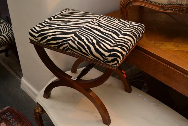 Appraisal: A PAIR PROVINICAL STOOLS WITH ZEBRA UPHOLSTRY