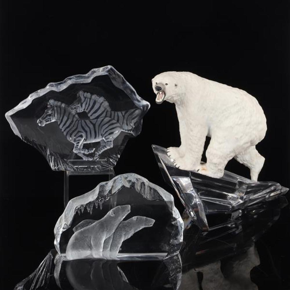 Appraisal: THREE WILDLIFE SCULPTURES TWO MATS JONASSON MALERAS SWEDEN CARVED CRYSTAL