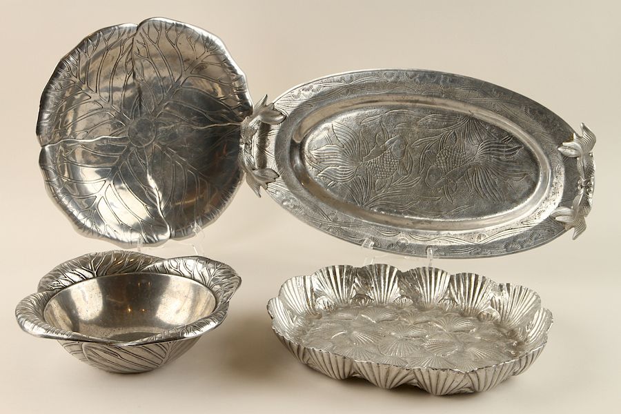 Appraisal: COLLECTION OF FOUR PEWTER TRAYS ARTHUR COURT A collection of