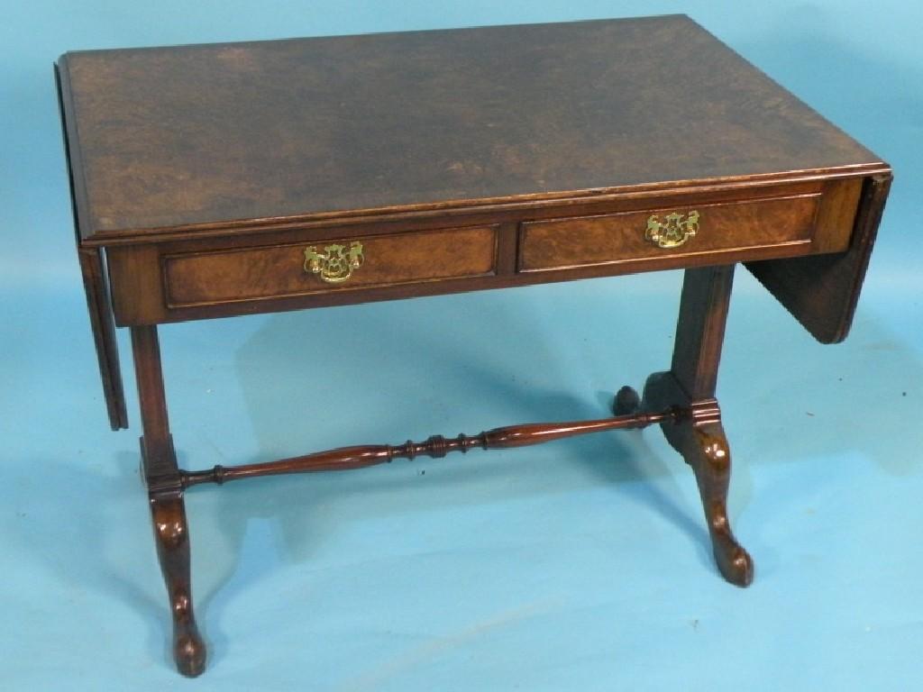 Appraisal: A burr walnut and cross banded sofa table with two