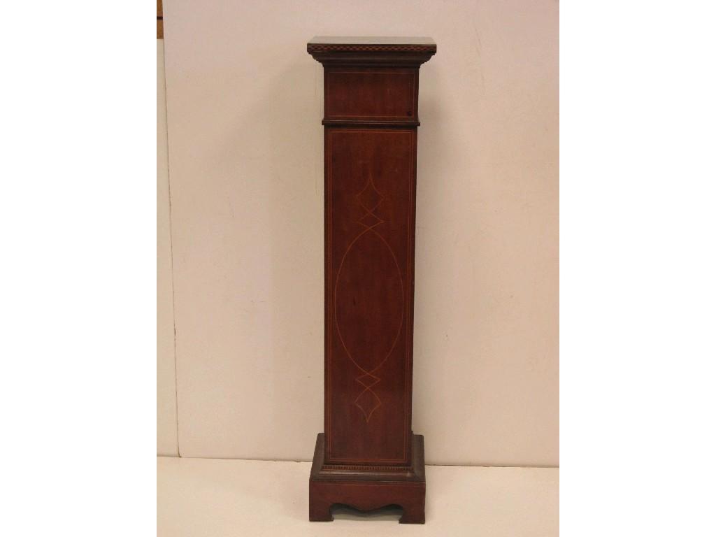 Appraisal: An Edwardian mahogany square section Torchere with satinwood stringing ft