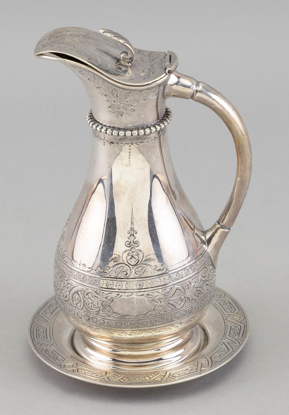 Appraisal: HADDOCK LINCOLN AND FOSS COIN SILVER PITCHER AND UNDER PLATE