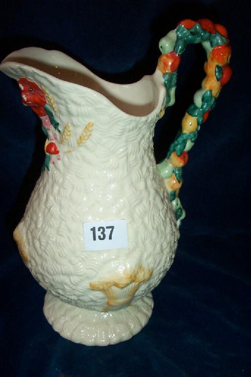 Appraisal: A Clarice Cliff Celtic Harvest pattern jug with relief moulded