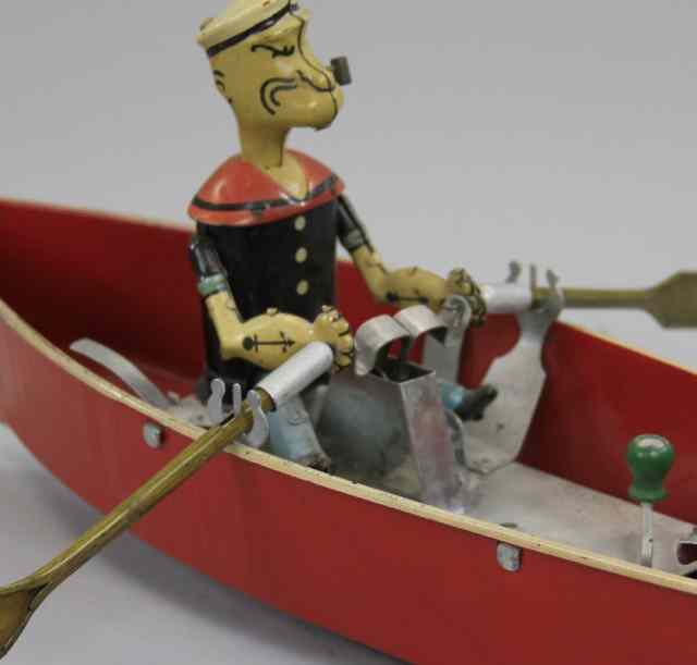 Appraisal: POPEYE IN ROWBOAT Hoge Mfg very desirable example pressed steel