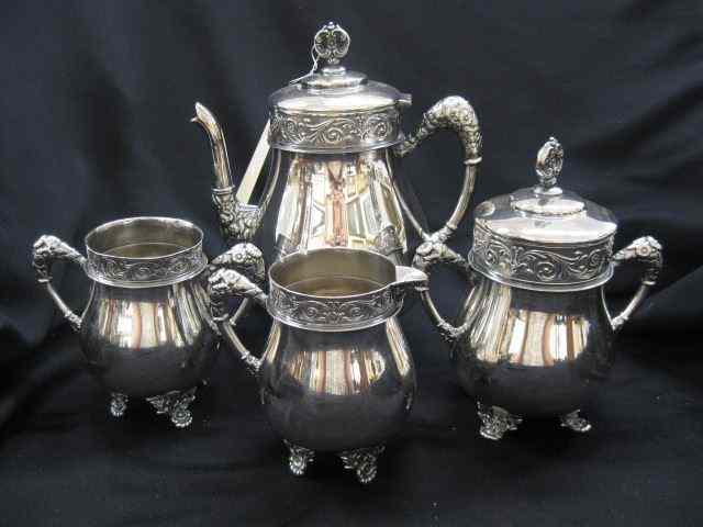 Appraisal: Victorian Silverplate Tea Service footed ornate '' teapot creamer sugar