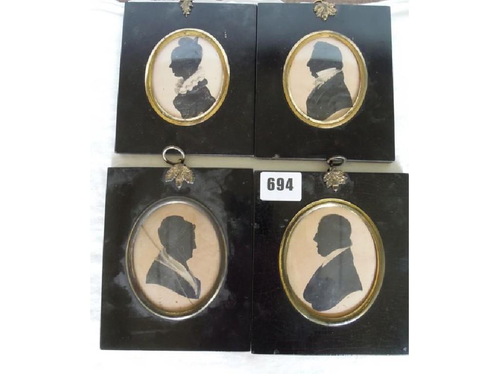 Appraisal: A collection of four early th century silhouette portrait miniatures