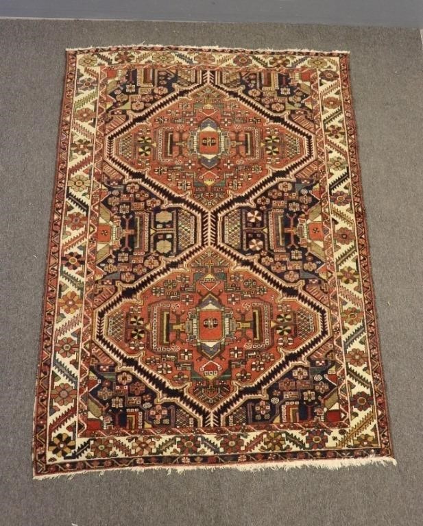 Appraisal: Colorful Persian center hall carpet with geometric patterns '- x