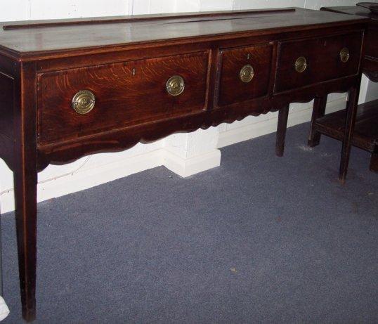 Appraisal: A late th Century oak dresser base the rectangular top