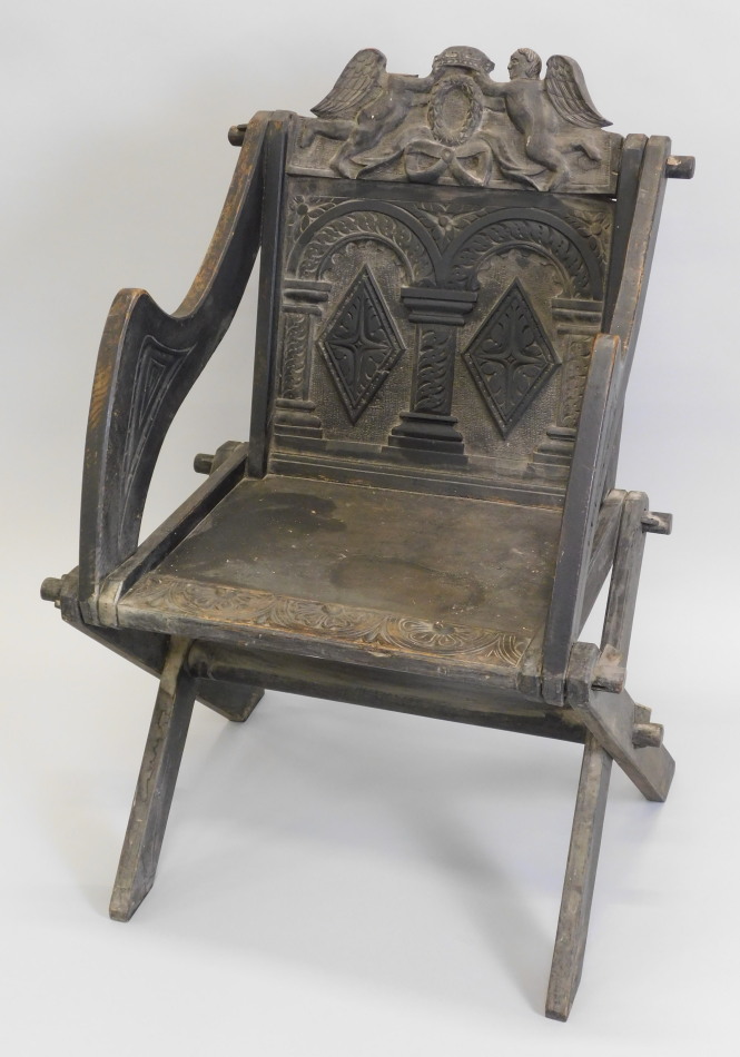 Appraisal: A Victorian carved oak Glastonbury type chair the back decorated