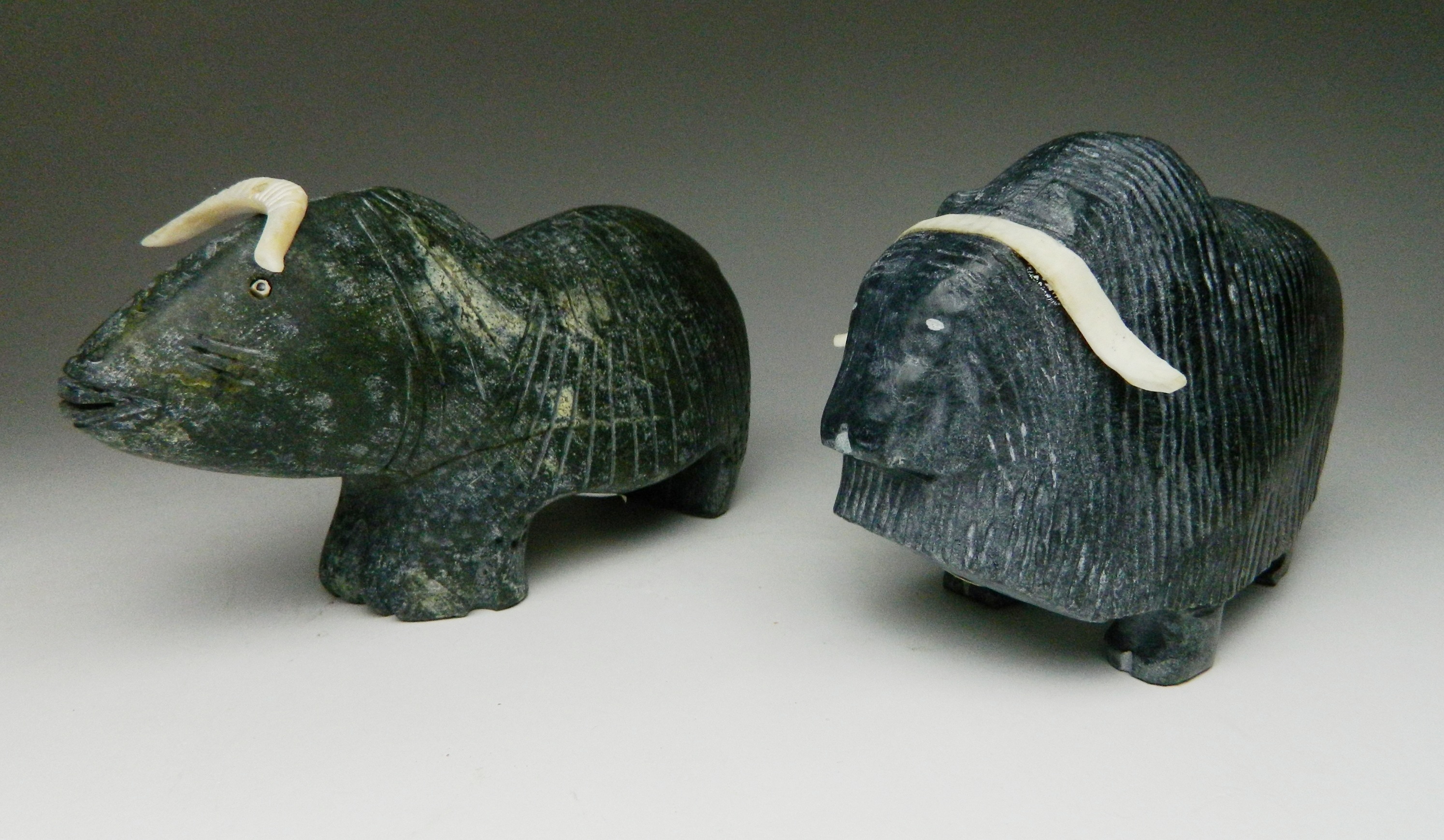 Appraisal: Inuit Muskox stone carvings Simon Kadlutsuak- Hall Beach ''h Andrew