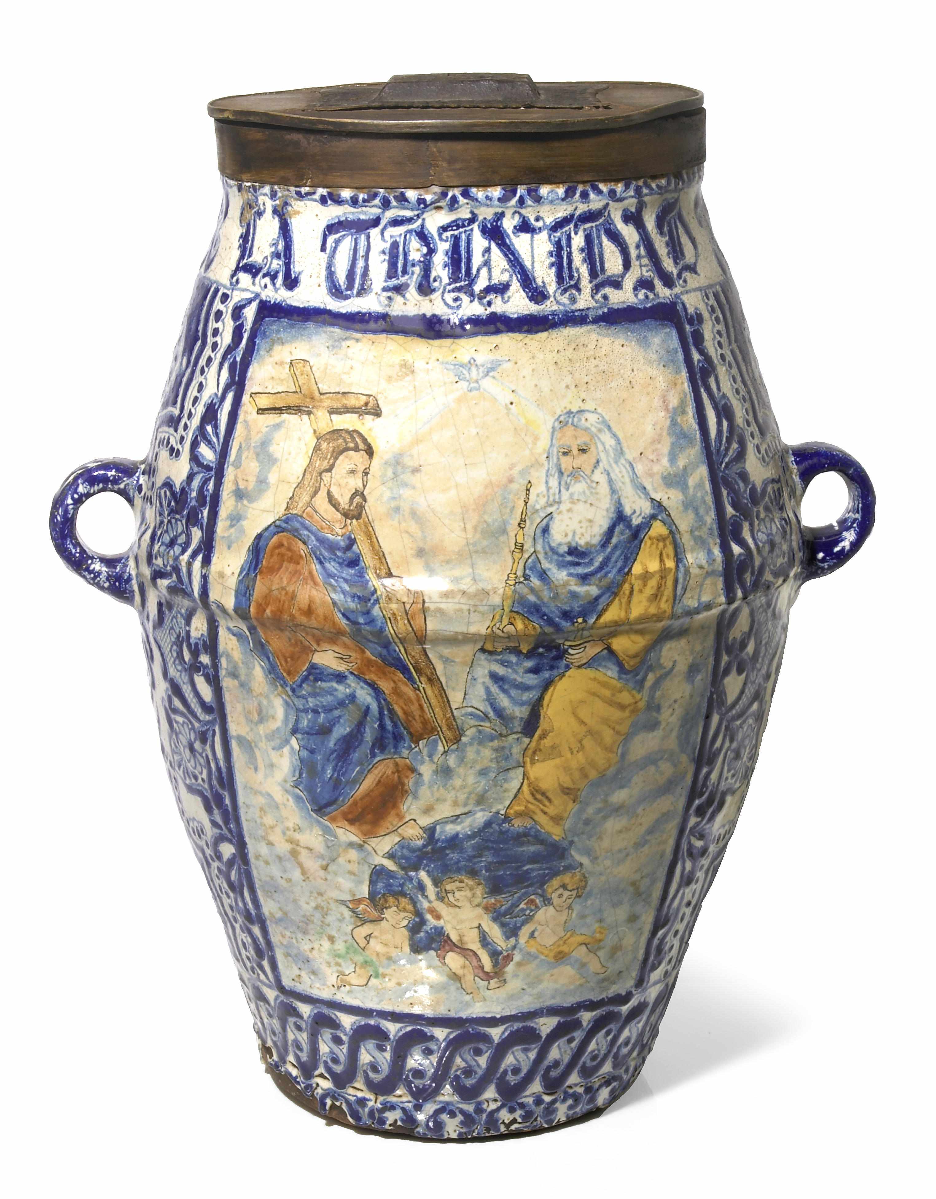 Appraisal: A Spanish tin glazed earthenware covered storage vessel th centuryheight