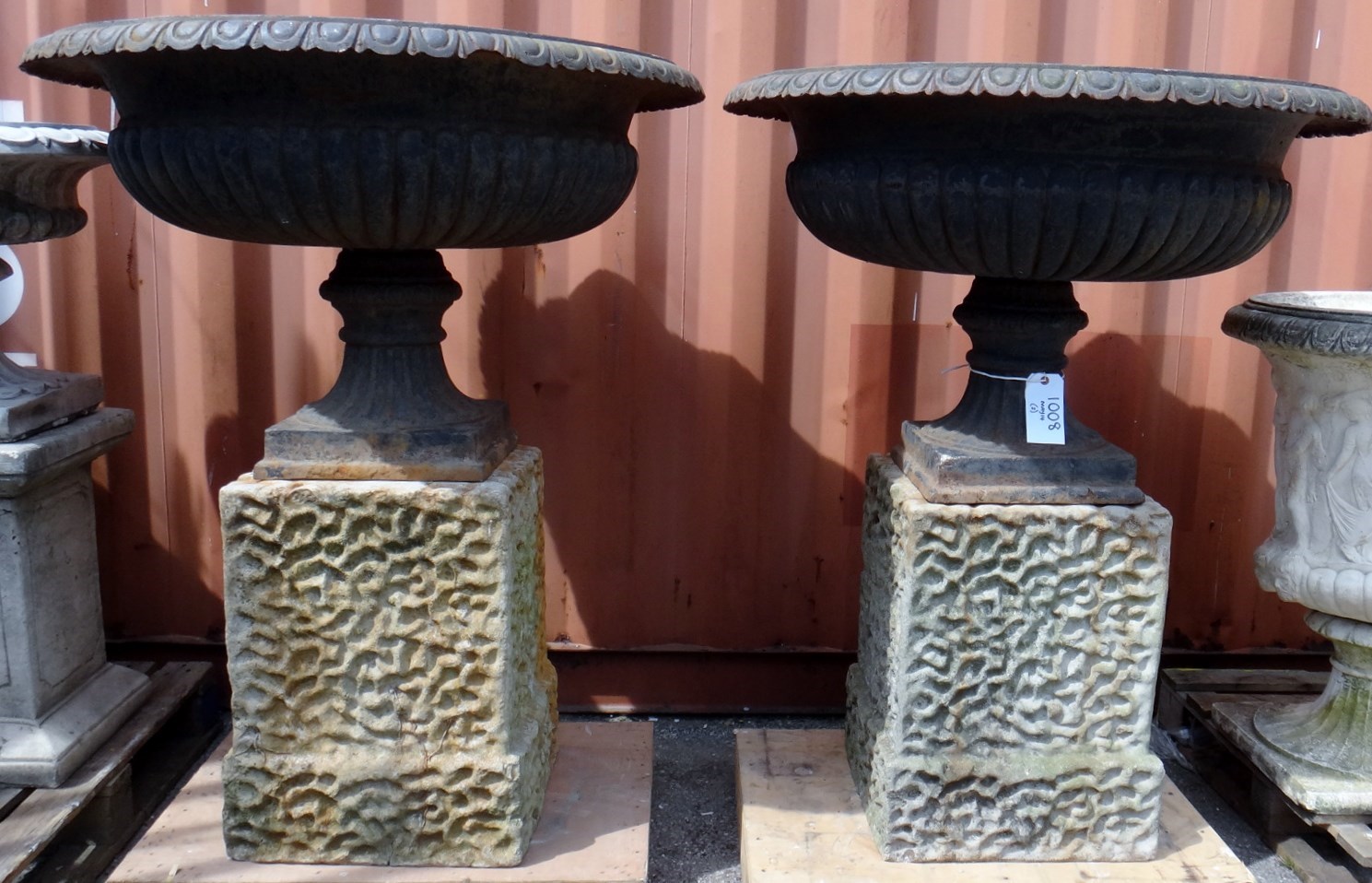 Appraisal: A pair of cast iron shallow fluted tazzas on wrigglework