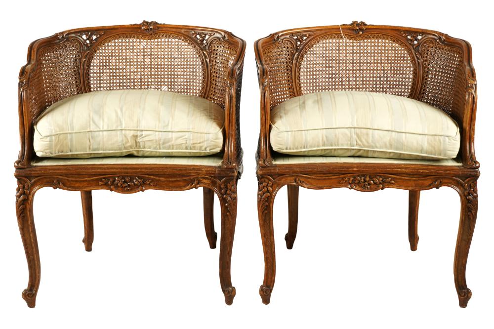 Appraisal: PAIR OF LOUIS XV STYLE CANED FRUITWOOD BERGERESlate th early