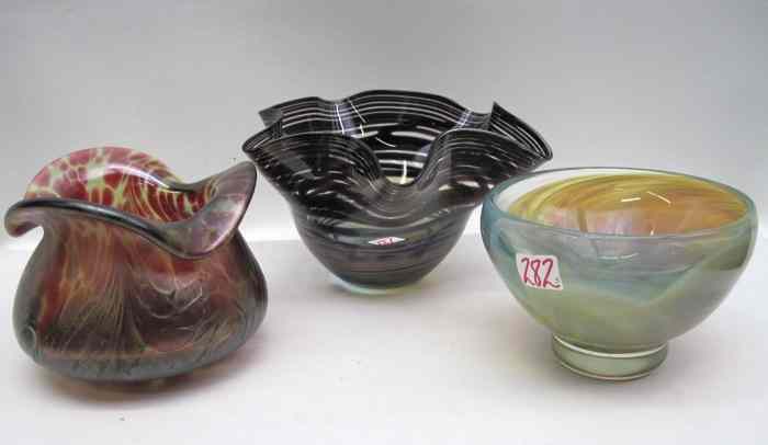 Appraisal: THREE SIGNED ART GLASS BOWLS a mottled red on yellow