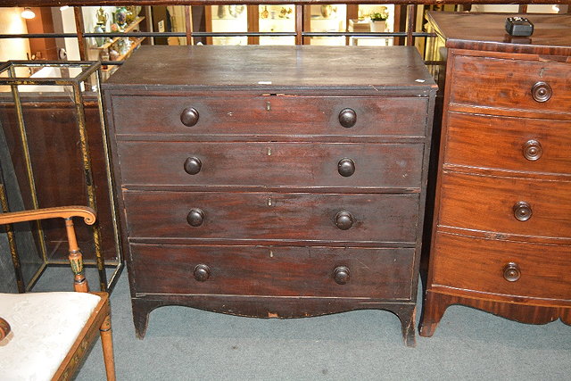 Appraisal: A th Century mahogany straight front chestof four long drawers