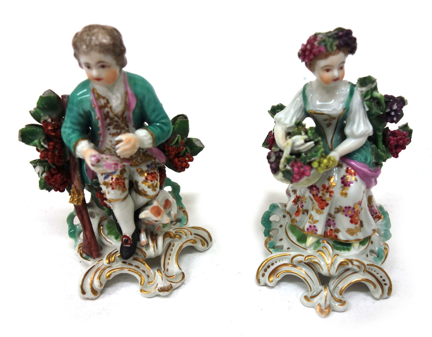 Appraisal: A pair of Derby porcelain figures of a sportsman and