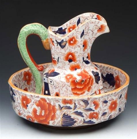 Appraisal: A TH CENTURY IRONSTONE CHINA TOILET JUG AND BASIN the