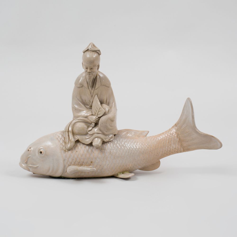 Appraisal: Japanese Porcelain Group of Kinko Riding a Carp x x