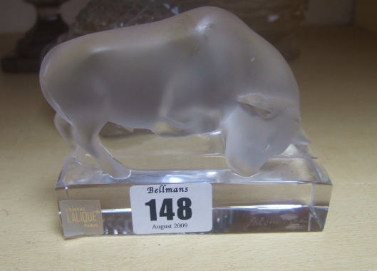 Appraisal: A Lalique clear and frosted glass figure of a bull